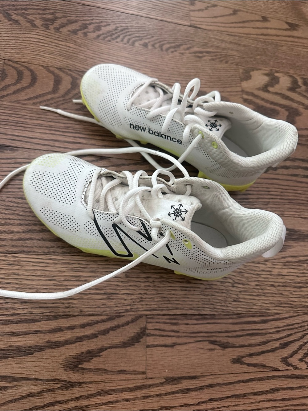 New Balance Freeze lacrosse cleats with Lime Accents